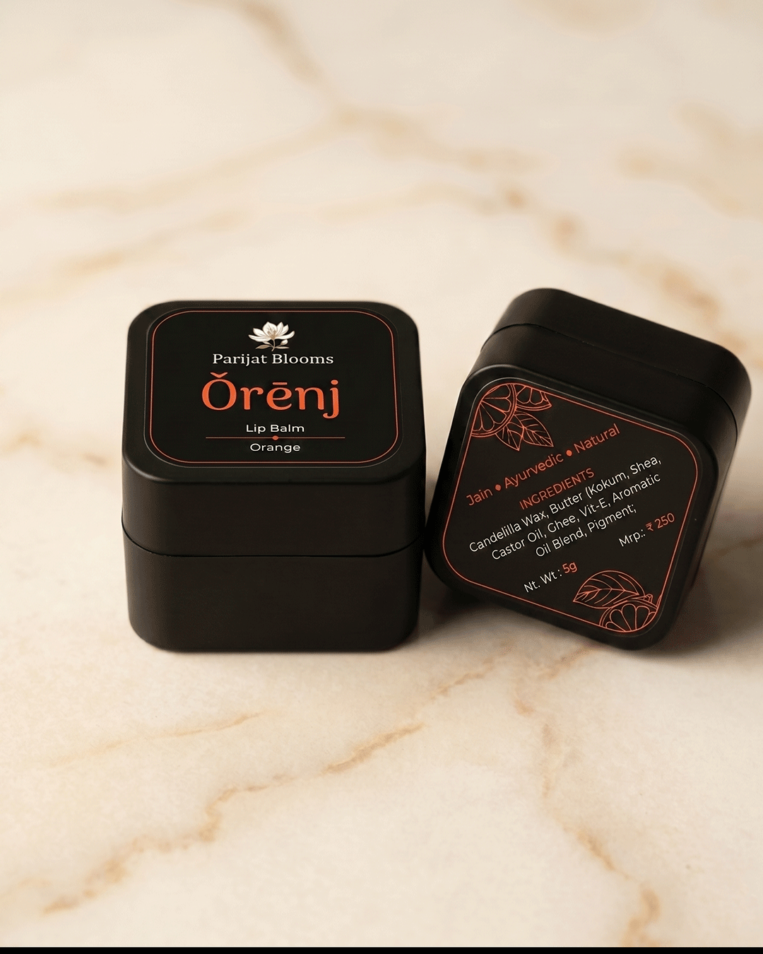 Orenj Orange Lip Balm label and packaging — Jain Vegan natural lip balm Parijat Blooms